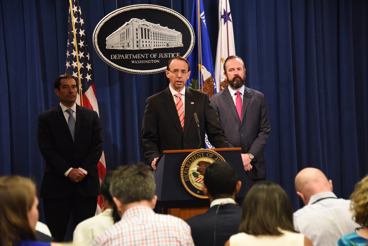 Deputy Attorney General Rod Rosenstein at a Justice Department lectern announcing charges against Russian intelligence officers on July 13, 2018.