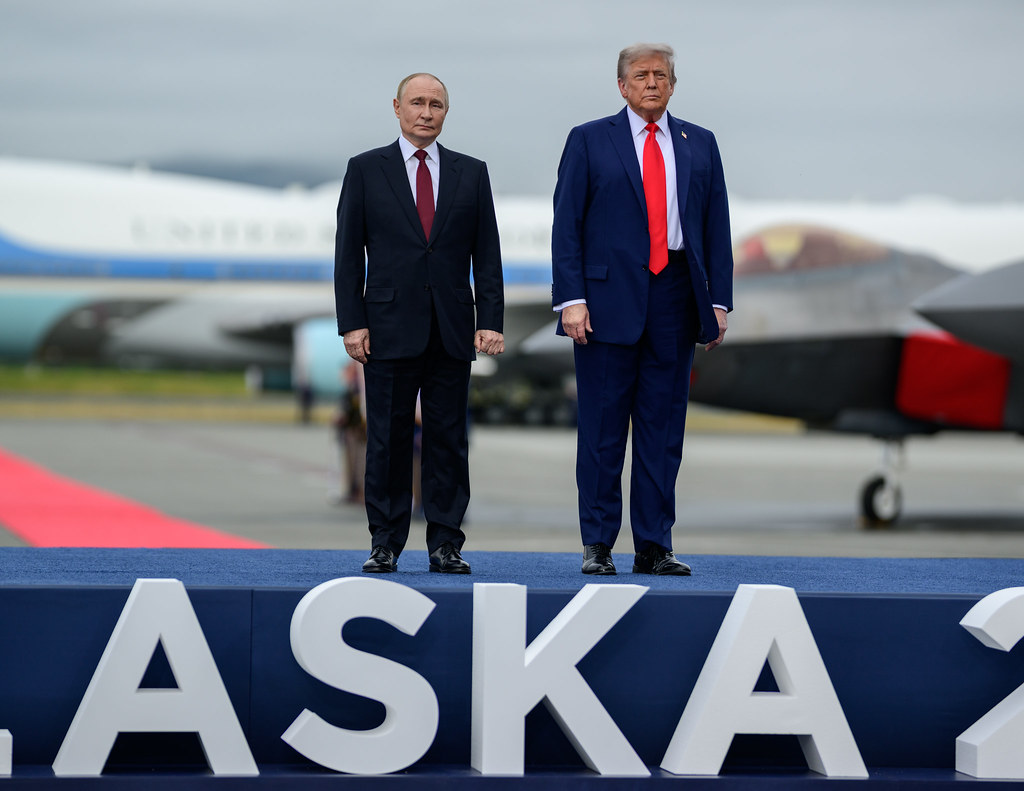 Donald Trump and Vladimir Putin standing together at their meeting in Anchorage, Alaska, on August 15, 2025.
